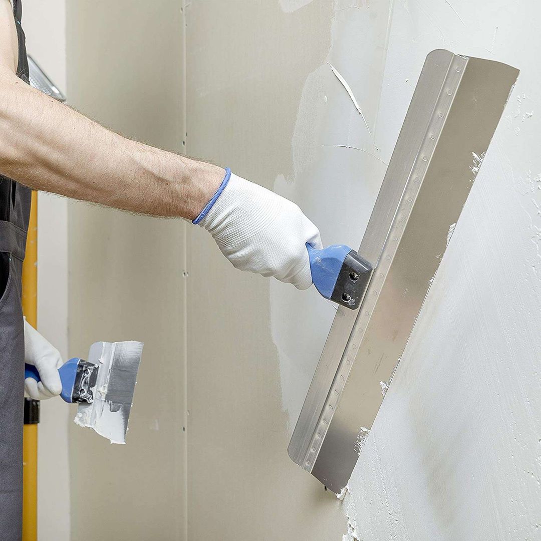 Cómo reparar una grieta de una pared de yeso