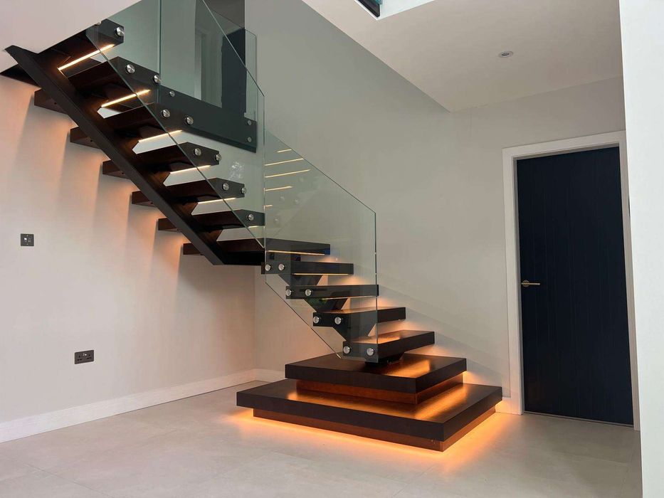 Modern floating staircase with led lighting and glass balustrades | homify