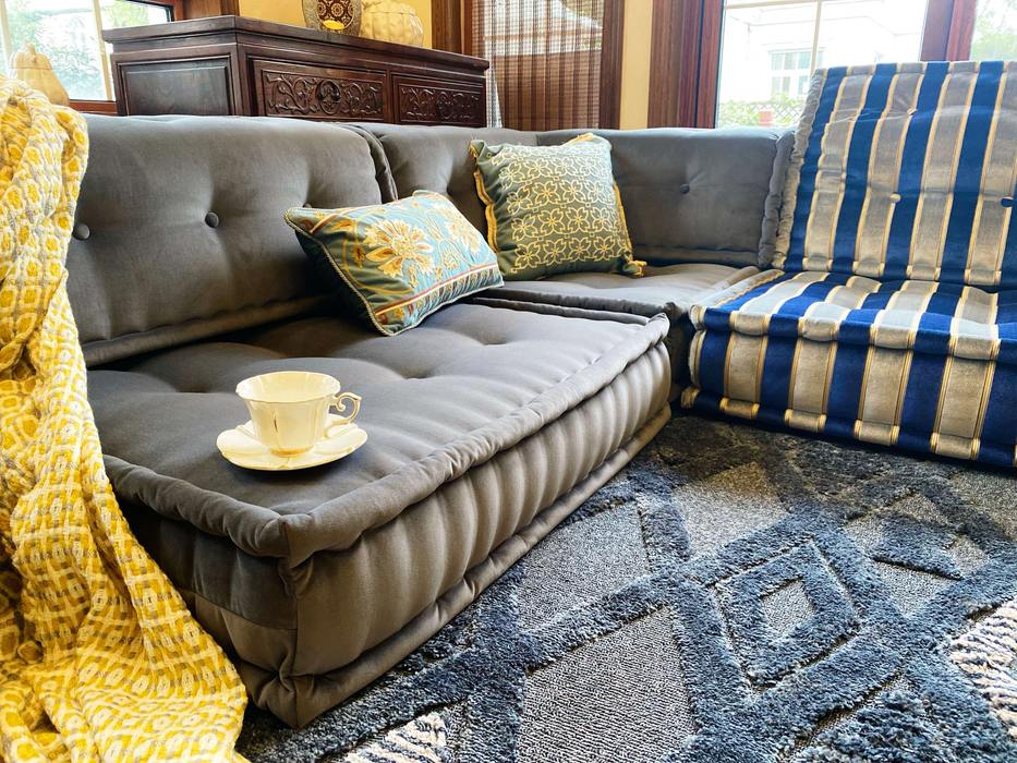 A close-up photo Lila & Lin Villas Couch, Furniture, Property, Blue, Comfort, Rectangle, Interior design, Living room, Textile, studio couch