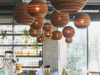 RAUM: Bar & Theken Beleuchtung, Designort Designort Modern dining room