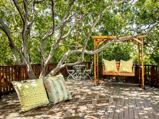 Outside deck Deborah Garth Interior Design International (Pty)Ltd Other spaces Solid Wood Multicolored Branch, Wood, Shade, Outdoor furniture, Natural landscape, Grass, Tree, Woody plant, Leisure, Landscape,Scatter cushions,rug,rubber,swing