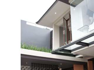 Home Hospitality Guesthouse, AIGI Architect + Associates AIGI Architect + Associates Villas
