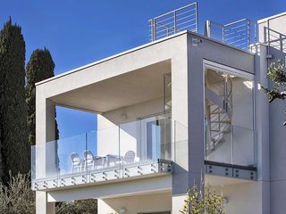 Villa bifamiliare in legno - Moniga del Garda (BS), Marlegno Marlegno Balcones y terrazas modernos
