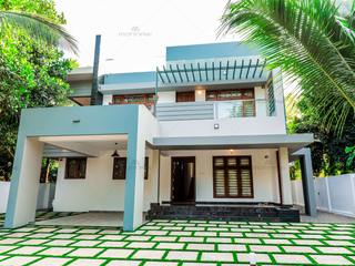 A Perfect Family Home With Contemporary Influences , Monnaie Interiors Pvt Ltd Monnaie Interiors Pvt Ltd Rumah tinggal