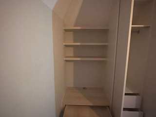 Loft Conversion with Bespoke Furniture: A Perfect Blend of Style and Functionality, Bravo London Ltd Bravo London Ltd Other spaces