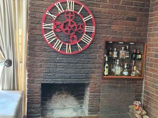 BEFORE IMAGE OF FIREPLACE Deborah Garth Interior Design International (Pty)Ltd Corridor & hallway Wood, Brickwork, Building, Brick, Hearth, Curtain, Hardwood, Flooring,Cornice