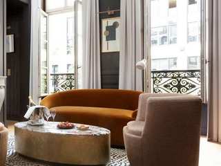 Tribute to the city's artistic heritage UpperKey Living room hotel management,boutique hotel management,UpperKey hotel management,hoteliers,UpperKey