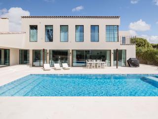 Casa Sobreira - Modern Fusion Overlooking the Ria Formosa, CORE Architects CORE Architects منزل عائلي صغير