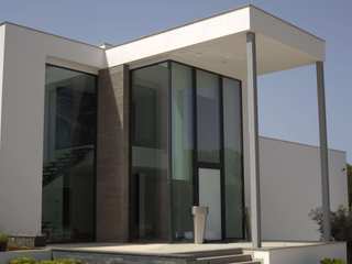 Moradia em Vilamoura, Fingerprint Architecture & Interior Design Fingerprint Architecture & Interior Design منزل عائلي صغير