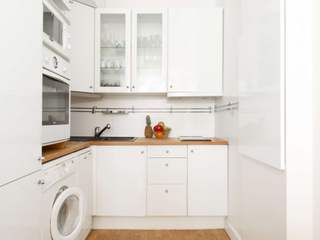 Cooking in a cozy Parisian apartment UpperKey Built-in kitchens UpperKey,Property Management,Guaranteed Rent,Airbnb Concierge,Paris Apartment,Paris,Property,Kitchen