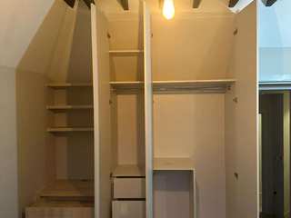 Loft Conversion with Bespoke Furniture: A Perfect Blend of Style and Functionality, Bravo London Ltd Bravo London Ltd غرف اخرى