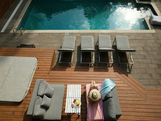 EA20250121-23420 Press profile homify Balcony Outdoor furniture, Furniture, Swimming pool, Wood, Sunlounger, Chair, Composite material, Umbrella, Resort, Outdoor Table