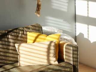 EA20250310-23568 Press profile homify Double Garage Interior design, Furniture, Floor, Living room, Couch, Daybed, Natural material, Cushion, Throw pillow, Den