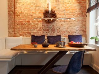 Rustico Ulrich Weinkath Living room Furniture, Wall, Interior design, Flooring, Wood, Floor, Table, Lighting, Chair, Room