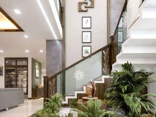 Interior Design Of Living & Courtyard Area.. , Monnaie Interiors Pvt Ltd Monnaie Interiors Pvt Ltd Ruang Keluarga Modern