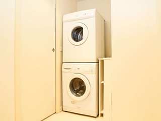 Freshness in every load UpperKey Laundry room Cameras & optics, Camera lens, Fixture, Wood, Gadget, Door, Circle, Audio equipment, Electronic device, Lens,UpperKey,Property Management,Guaranteed Rent,Airbnb Concierge,Hotel Management,Boutique Hotel Management,Airbnb management for hosts